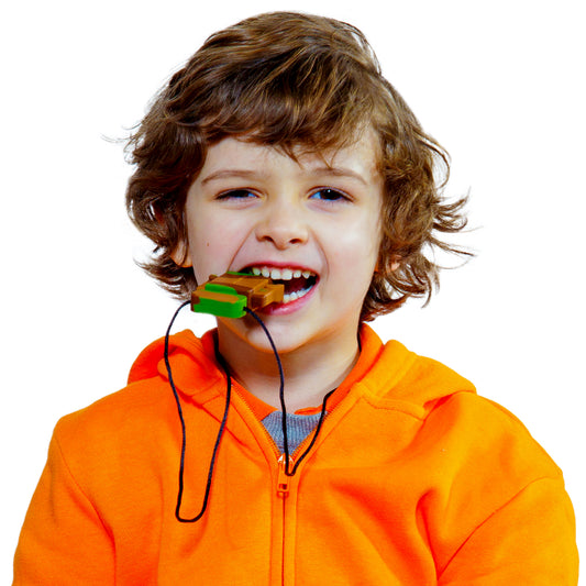 Boy using the Robot Chewy necklace