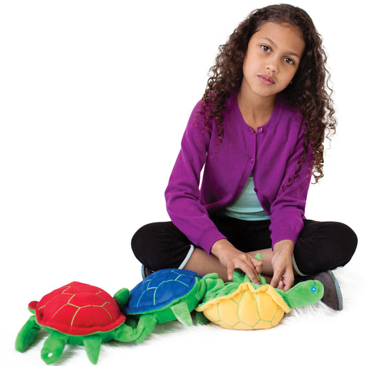 Girl playing with the Snapping Turtles for Fine Motor Skills - Set of 3