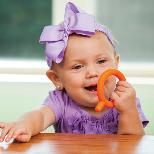 Baby using the P's & Q's - Sensory Soothers