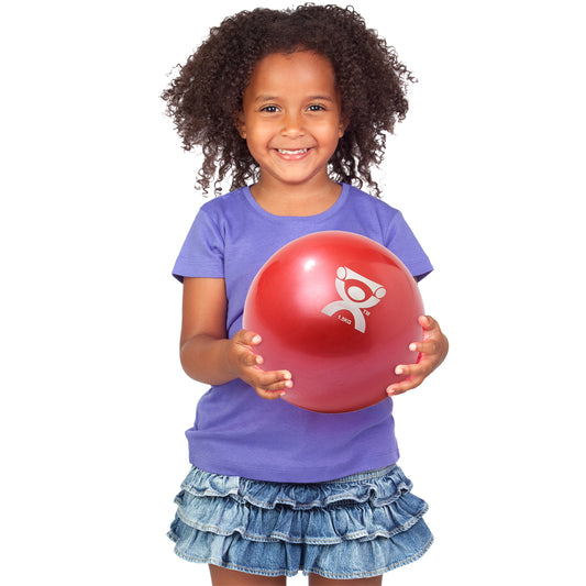 Girl holding the 1.5kg red CanDo® Weighted Hand Ball