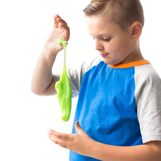 Child playing with green scented putty