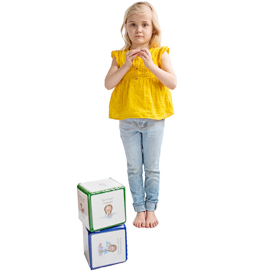 Girl standing next to the Regulation Cubes