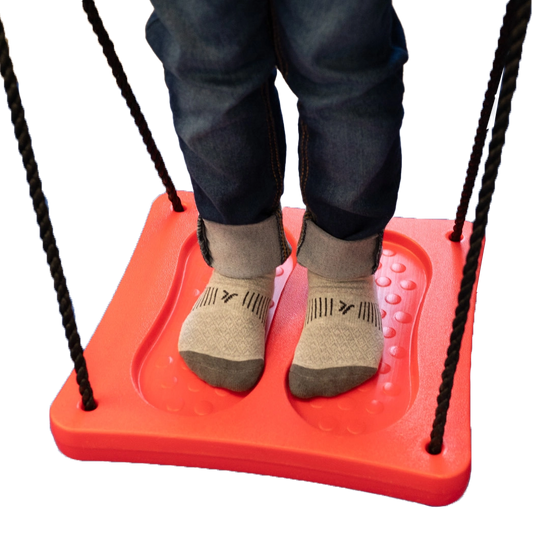 boys feet on the red Standing Swing