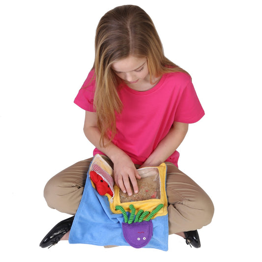 Girl looking at the At the Beach Discovery Bag