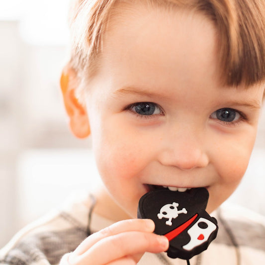 Boy using the Pirate Chewy Necklace