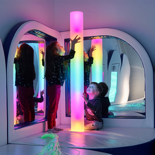 Children playing with lit up Waterless LED Color Column