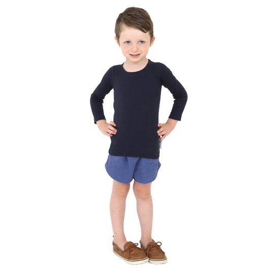 Child wearing the navy blue long sleeve Ribbed Hug Tee