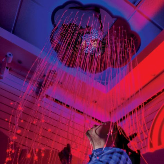 glowing, pink color-changing fiber optic lights