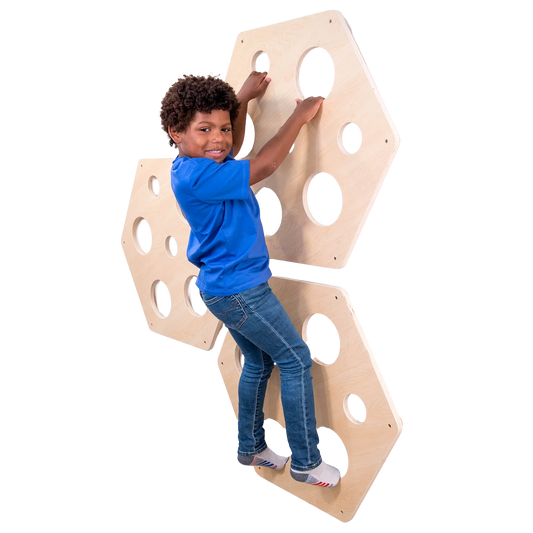Child climbing on the Honeycomb Climbing Panels - Set of 3