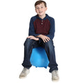 Boy using the yellow Chair Ball