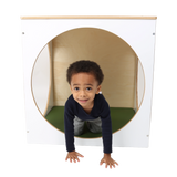 Child playing inside the ElevatED™ Play House Cube
