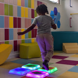 Child stepping on the Gel Step 'N Glow - Set of 4
