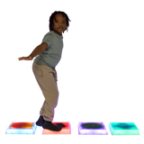 Side view of child standing on the Gel Step 'N Glow - Set of 4