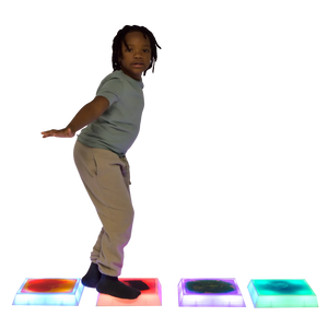 Side view of child standing on the Gel Step 'N Glow - Set of 4