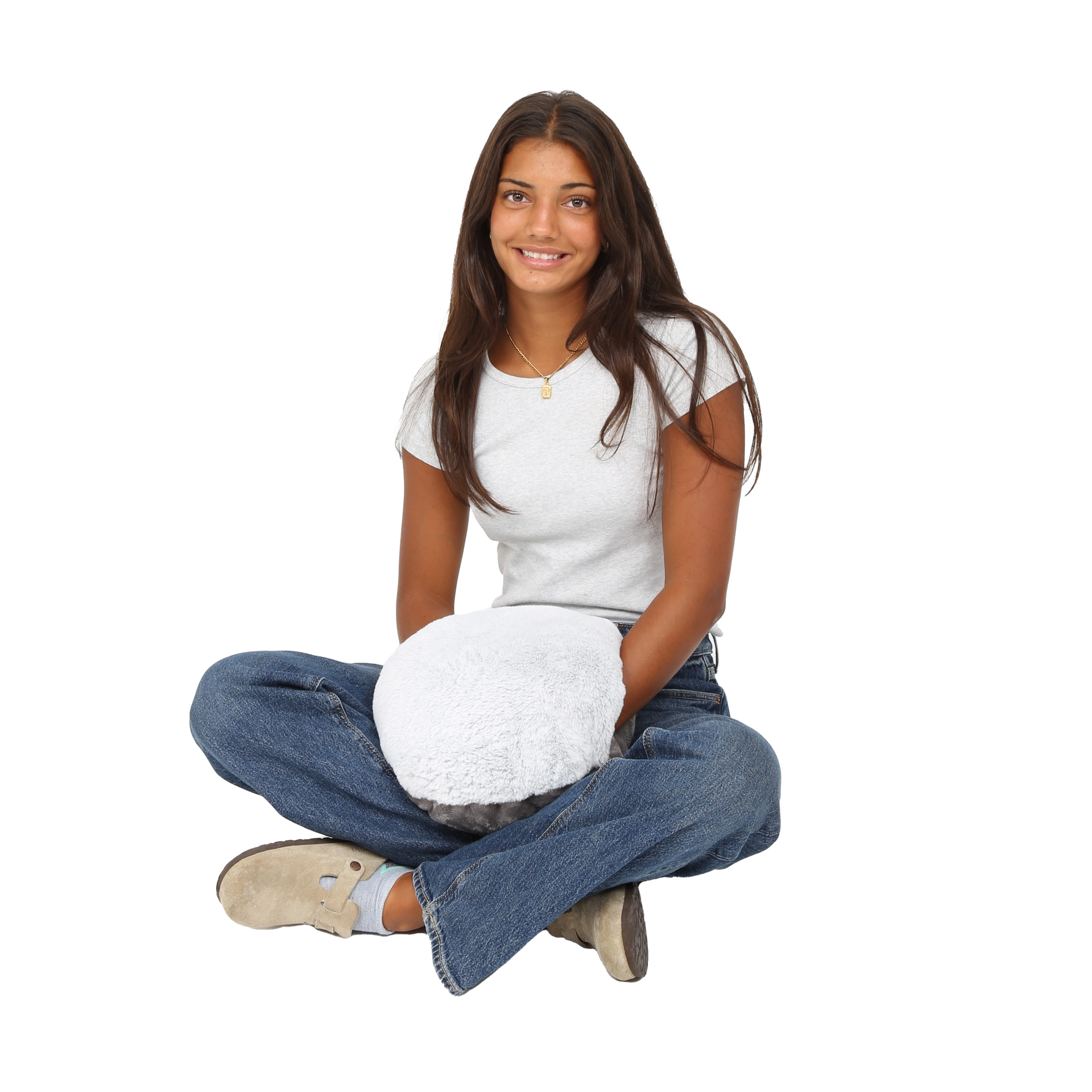 Girl using the Hand-Hugger Weighted Pillow