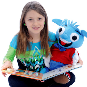 Girl smiling while holding Heavy Herbert - Weighted Stuffed Animal