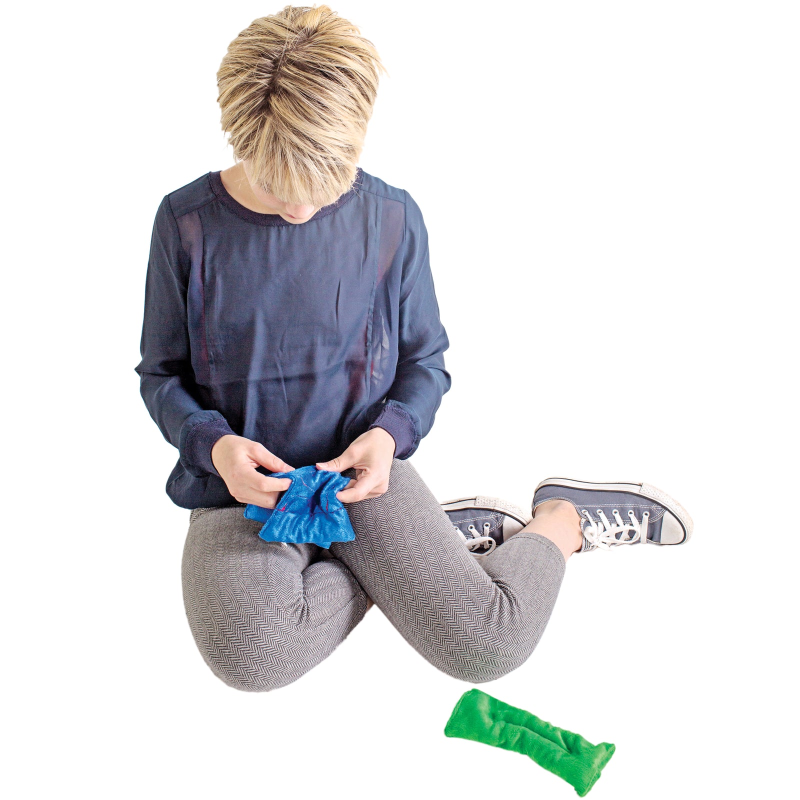 Child playing with the Busy Fingers ™ Marble Maze Kit