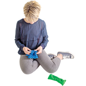 Child playing with the Busy Fingers ™ Marble Maze Kit