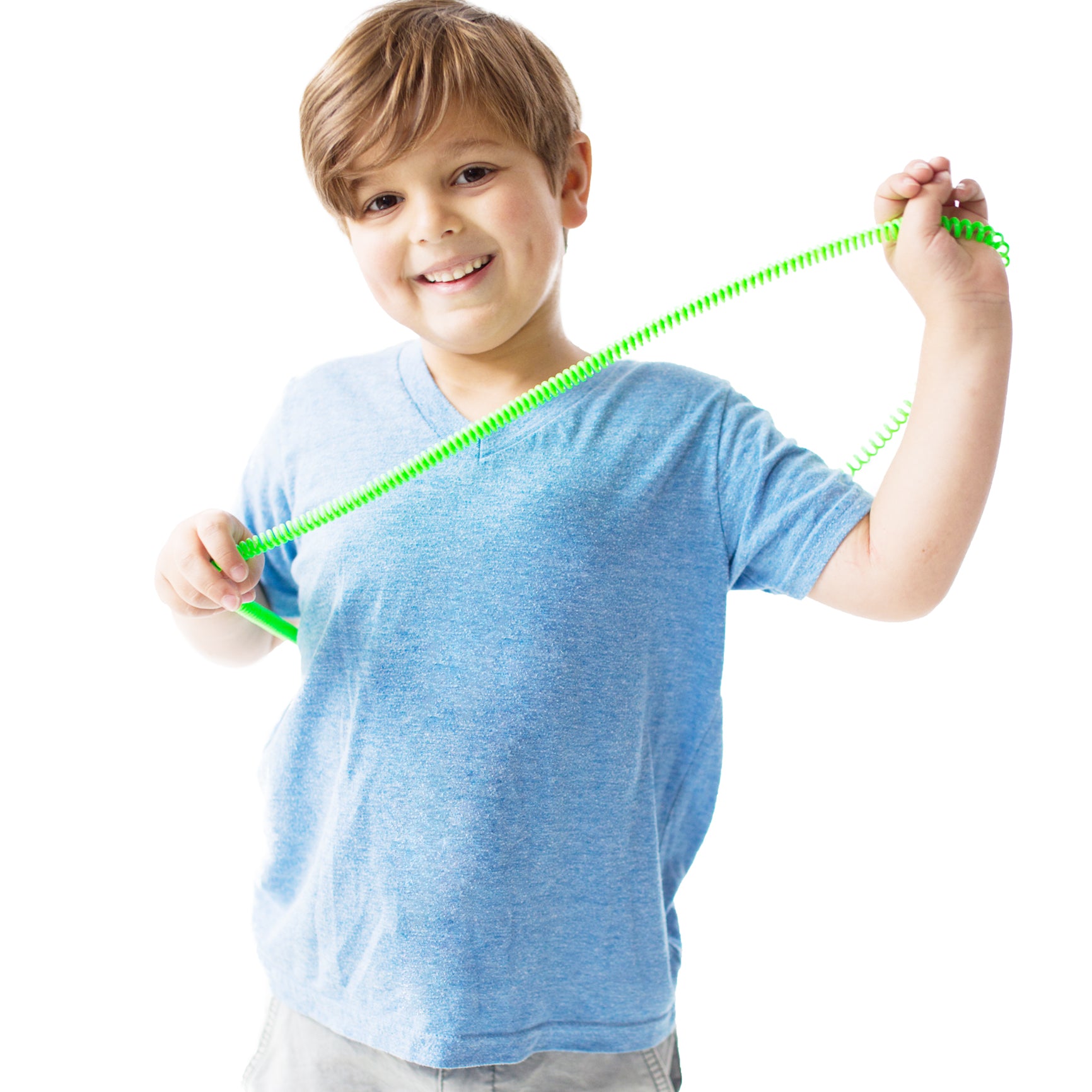 Boy smiling while using the green Chewy Fidget Coil