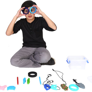Boy playing with the Bucket of 15 silicone chewies including necklaces, bangles and pencil toppers