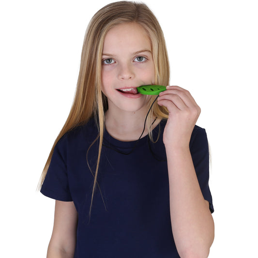 Girl biting the Calming Leaf Chewy
