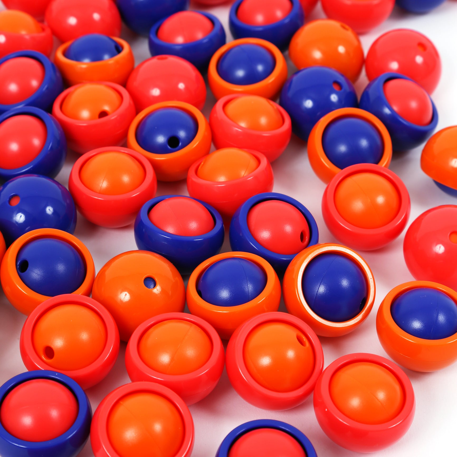 Rollease balls in Colors: Orange, red and blue