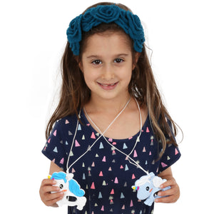 Girl smiling while wearing the Unicorn Necklace - Set of 2
