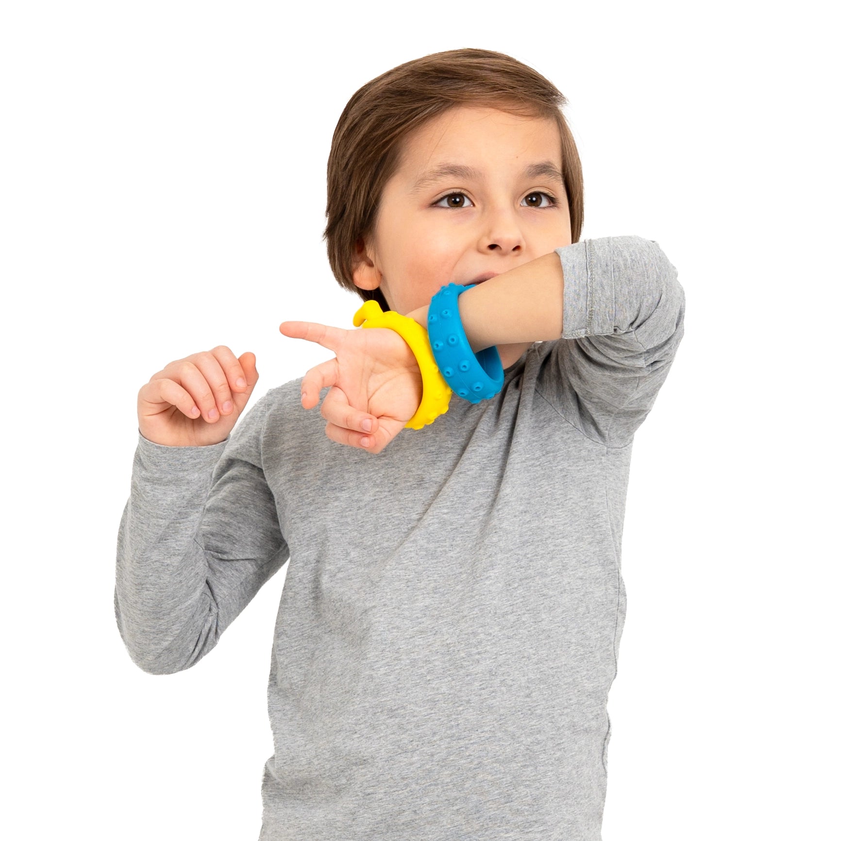 Boy chewing the Seahorse Chewy Bracelet
