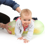 Baby playing with the sensory Rumble Roller