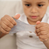 Child playing with the Sensory Basics Glitter Putty