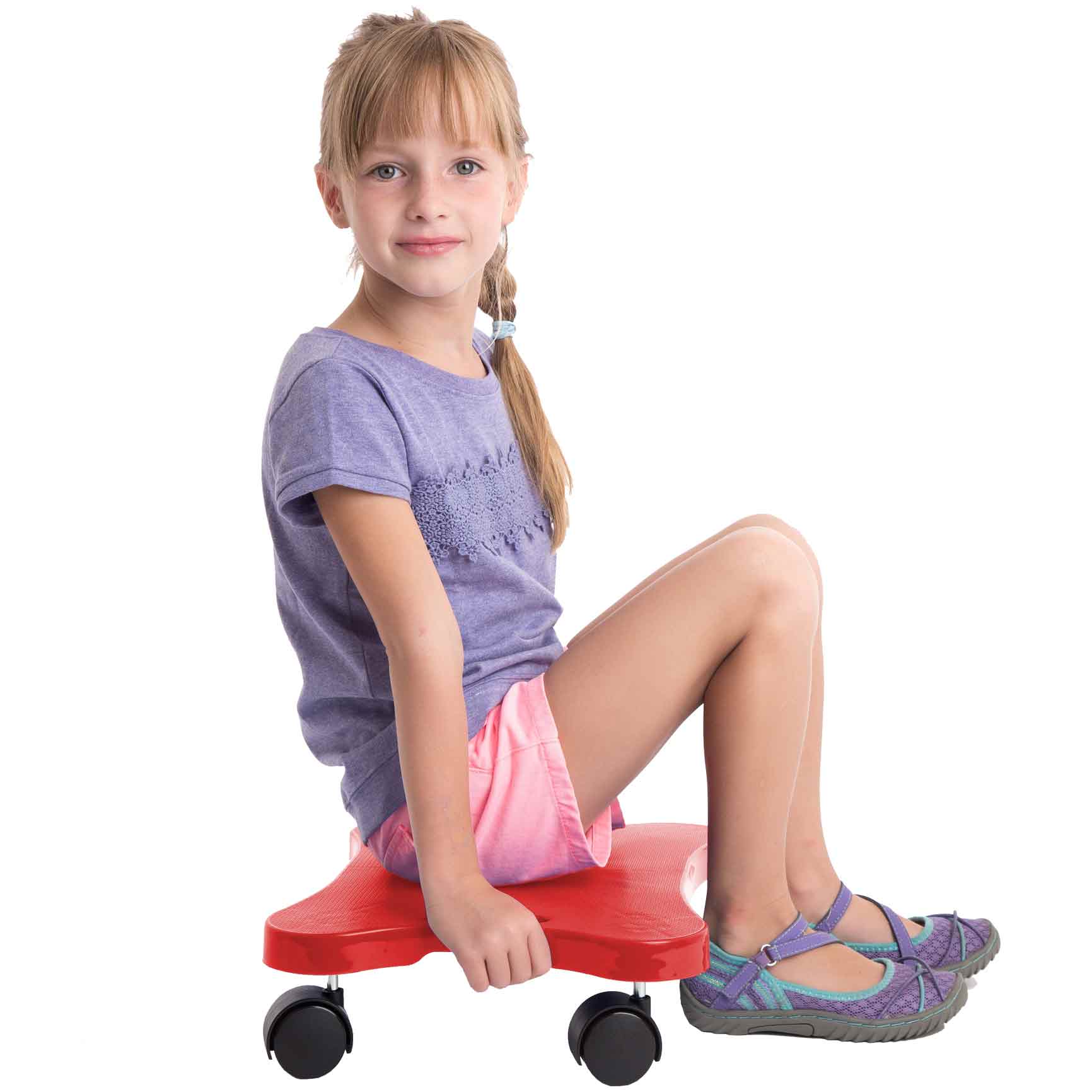 Girl smiling while using the Scooter Board With Handles - Red