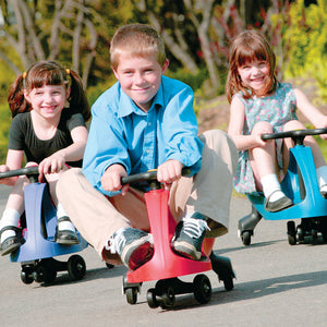 Children smiling while using the Plasma Cars