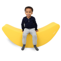 Child sitting on the SensaSoft™ Banana Rocker