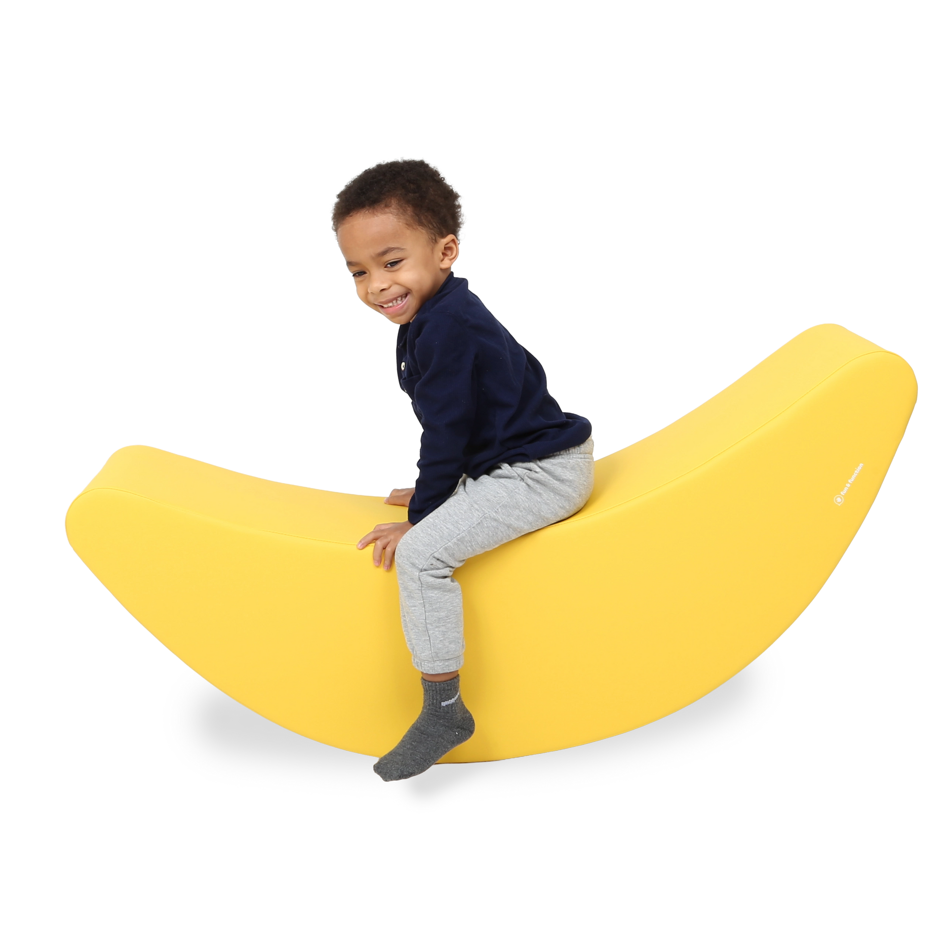 Child using the SensaSoft™ Banana Rocker