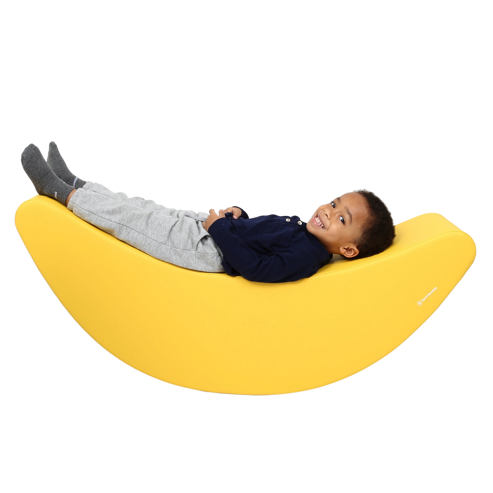 Child laying back on the SensaSoft™ Banana Rocker