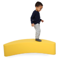Child standing on the SensaSoft™ Banana Rocker