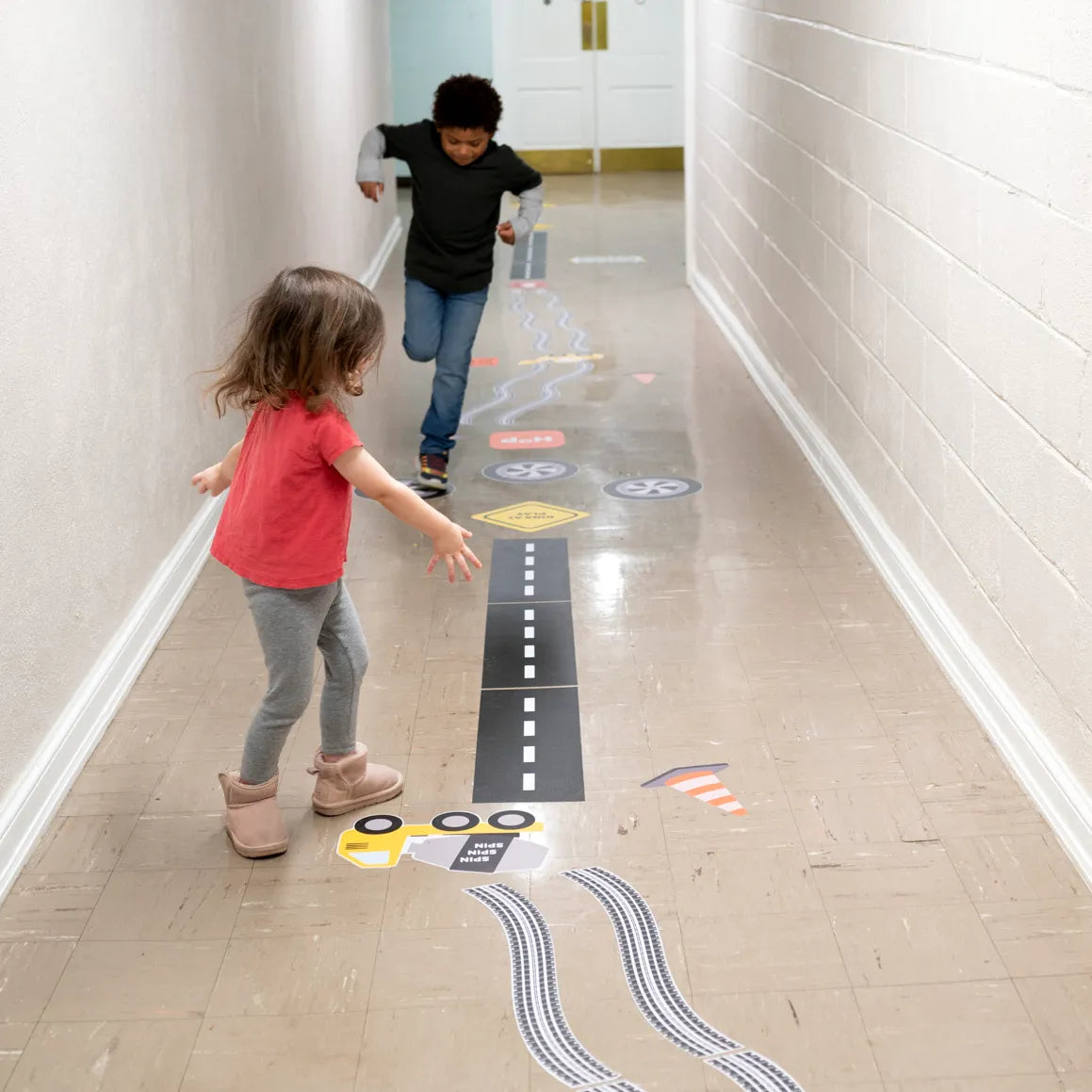 children playing with the construction themed Sensory Pathway Decals