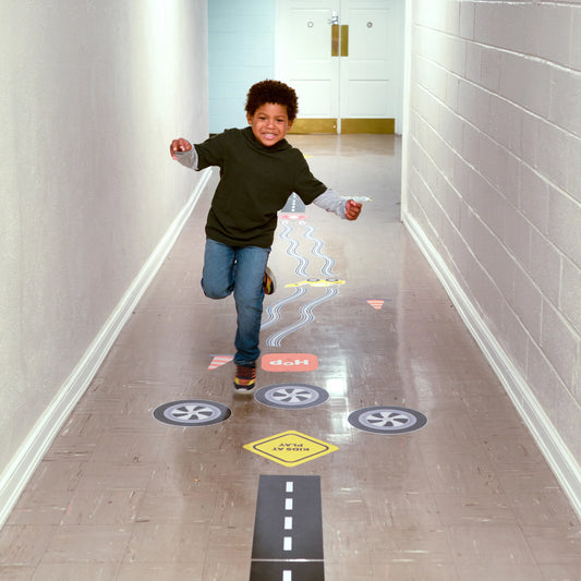 Child running on Sensory Pathway Decals 