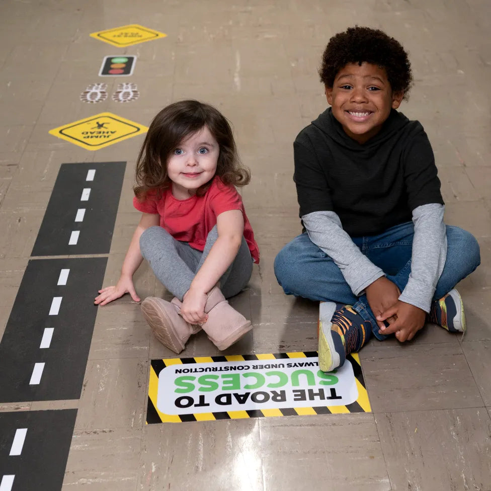 children smiling near the Sensory Pathway Decals