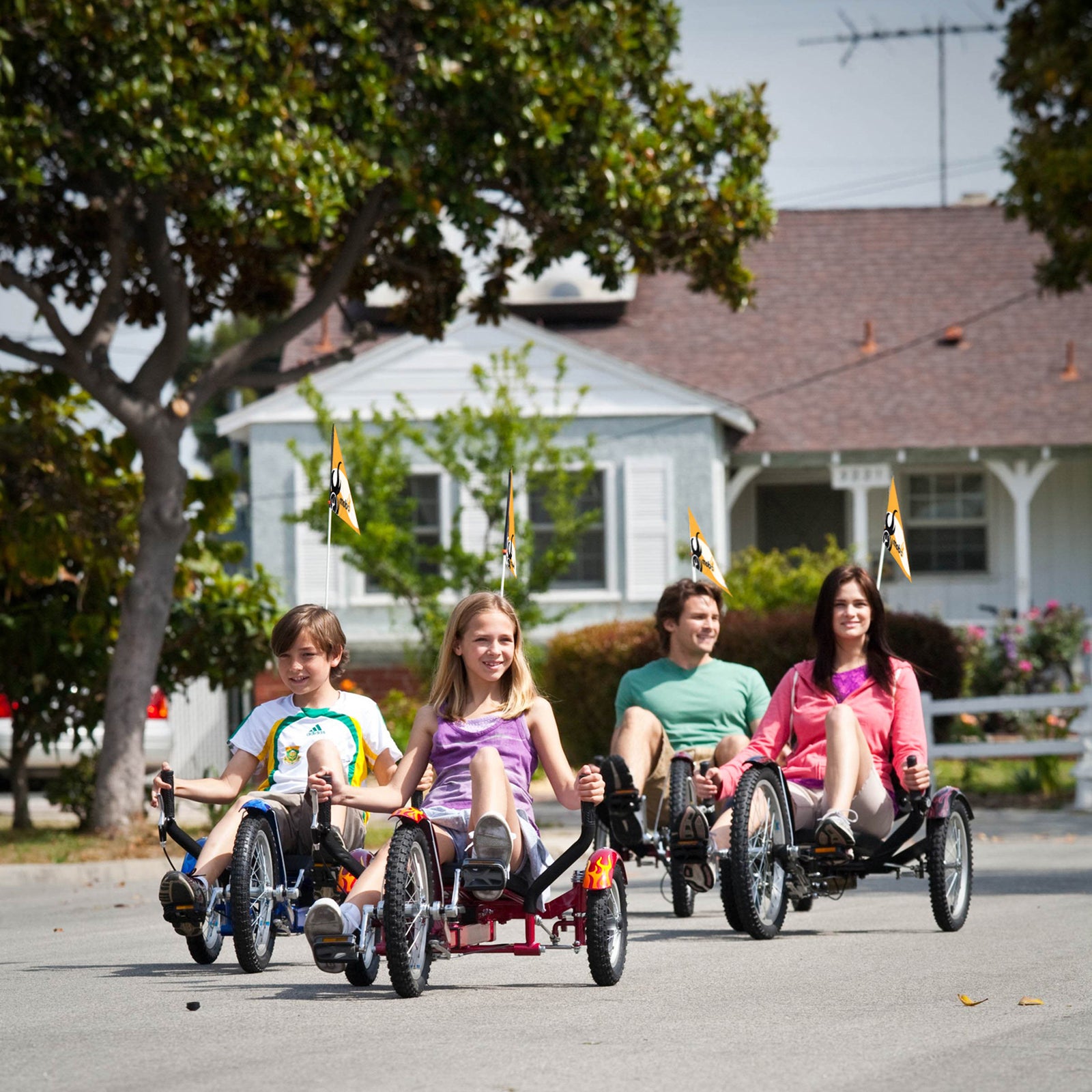 parents and children smiling while using the Mobo Triton