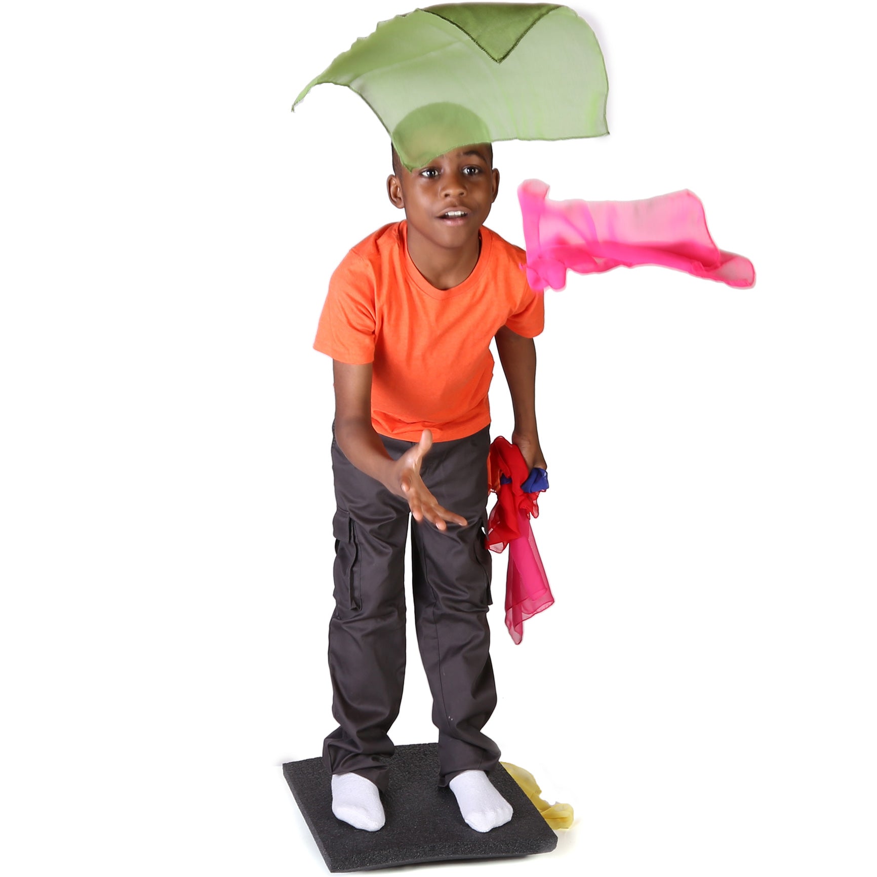 Boy standing on the Foam Rocker Board
