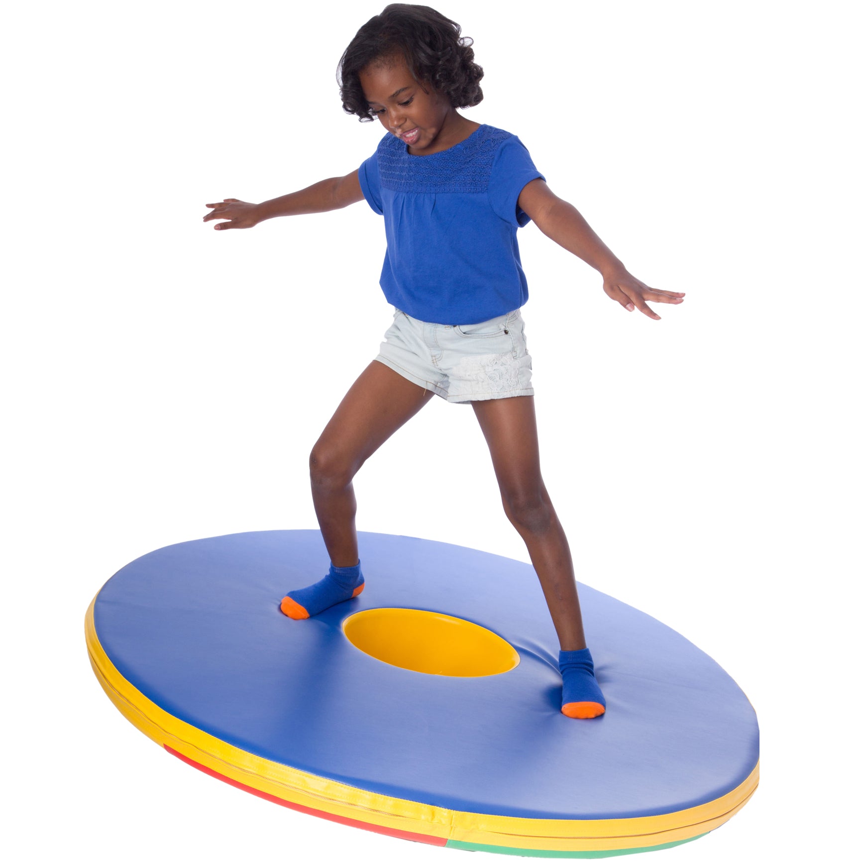 Girl smiling while playing on the SensaSoft™ Rockin Roll Top