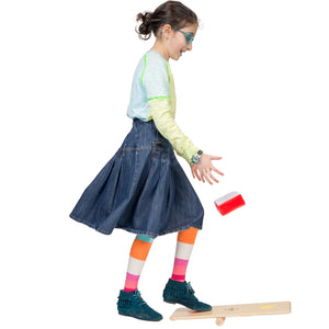 Girl playing on the Stomp, Rock and Walk Board