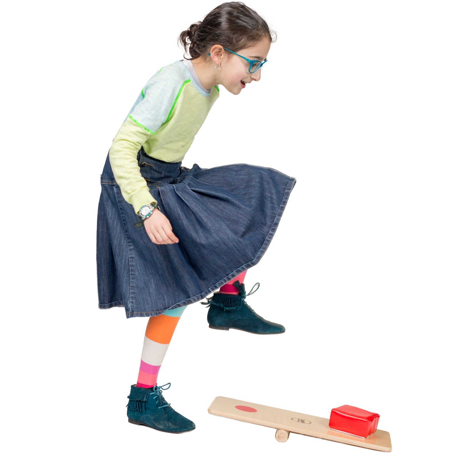 Girl playing on the Stomp, Rock and Walk Board