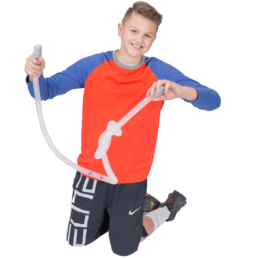 Boy smiling while holding the Marble Tracker