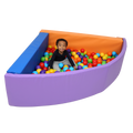 Child sitting inside the SensaSoft™ Foldable Ball Pit - Corner