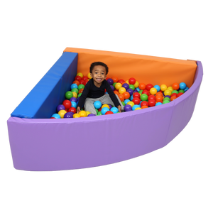 Child sitting inside the SensaSoft™ Foldable Ball Pit - Corner
