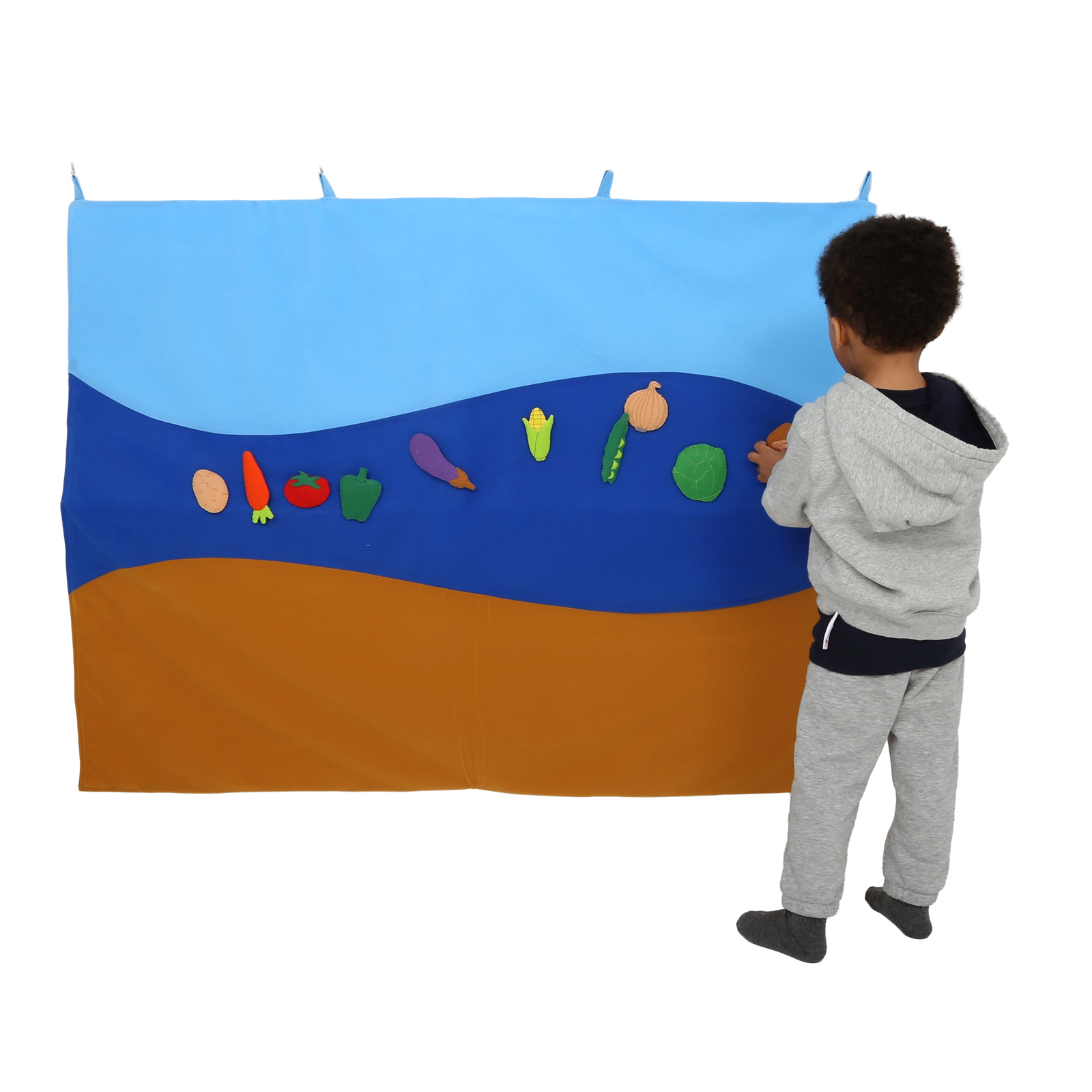 Child using the Felt Storyboard