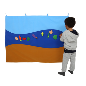 Child using the Felt Storyboard
