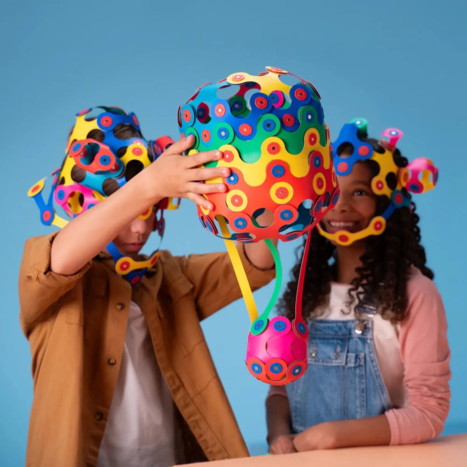 Children playing with the Clixo Creation Station - Small